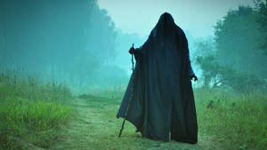 Man In Black Cloak Scary Wallpaper