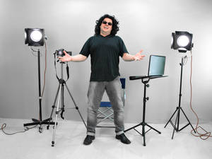 Man In Photography Studio Wallpaper