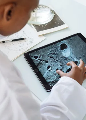 Man Learning About The Moon Wallpaper