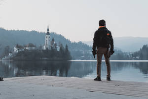 Man On Lake Bled Slovenia Wallpaper