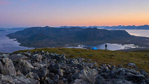 Man Overlooking Hd Mountain Fjord Wallpaper