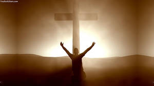 Man Praying To Cross Of The Christian God Wallpaper