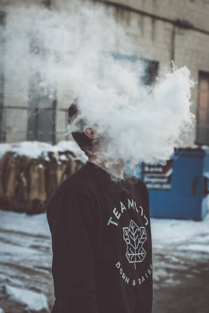 Man Smoking Outside Wallpaper