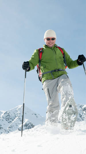 Man Snowshoeing Snow Mountain Wallpaper