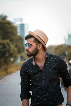 Man Wearing A Black Dress Shirt Wallpaper