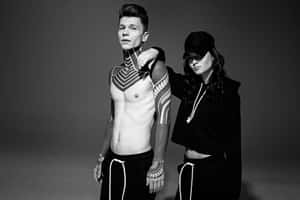 Man With Black Gangster Tattoos Wallpaper