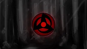 Mangekyou Sharingan Logo In Forest Wallpaper