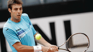 Marcel Granollers In Action Wearing A Light Blue Shirt Wallpaper