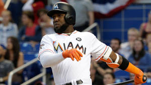 Marcell Ozuna With Orange Baseball Gloves Wallpaper