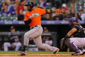 Marcell Ozuna With Orange Jersey Wallpaper