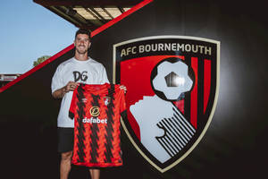 Marcos Senesi With Afc Bournemouth Shirt Wallpaper