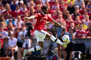 Marcus Rashford Mid-jump Wallpaper