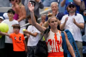 Maria Sakkari Powering Through A Tennis Match Wallpaper