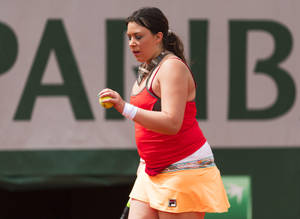 Marion Bartoli Shimmering In A Vibrant Red And Orange Tennis Outfit. Wallpaper