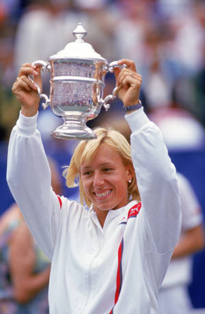 Martina Navratilova Smiling With Trophy Wallpaper