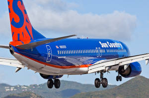 Marvelous Mountain With Sun Country Aircraft Wallpaper