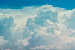 Marvelous View Of The Heavenly White Fluffy Clouds Wallpaper