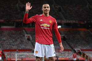 Mason Greenwood Waving Wallpaper