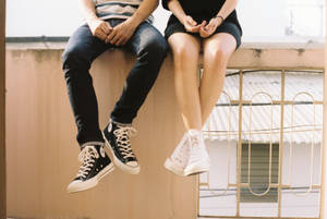 Matching Converse Shoes For Couples Wallpaper