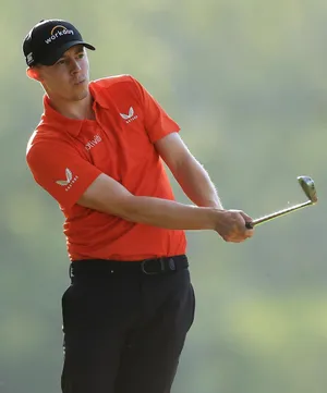 Matt Fitzpatrick Striking Golf Ball Wallpaper