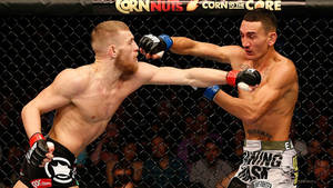 Max Holloway Vs Conor Mcgregor Wallpaper