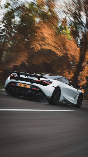 Mclaren 720s White Car Speeding Phone Wallpaper