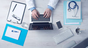 Medical Practitioner Large Office Desk Wallpaper