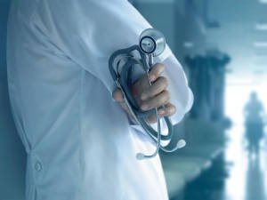 Medical Professional Preparing For Surgery Wallpaper