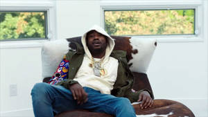 Meek Mill On The Couch Wallpaper