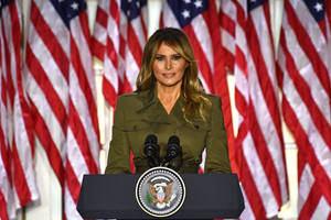 Melania Trump On A Podium Wallpaper