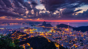 Mesmerizing Night View Of Rio De Janeiro, South America Wallpaper