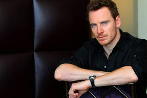 Michael Fassbender On Chair Wallpaper