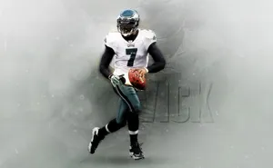 Michael Vick In Action Playing Football Wallpaper