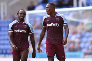 Michail Antonio Walking With Teammate Wallpaper