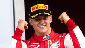 Mick Schumacher Raised Fists Close-up Wallpaper