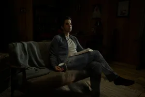 Midnight Mass Father Paul On Sofa Wallpaper