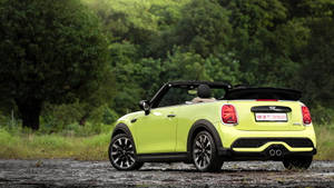 Mini Neon Green Car In Forest Wallpaper