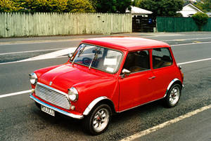 Mini Red Aesthetic On Road Wallpaper