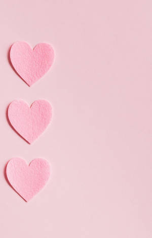 Minimalist Baby Pink Hearts Wallpaper
