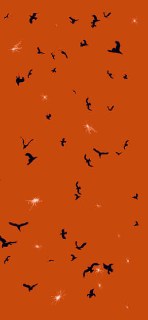 Minimalist Orange Halloween Bats Wallpaper