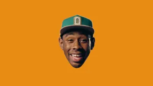 Minimalist Orange Tyler The Creator Cover Wallpaper