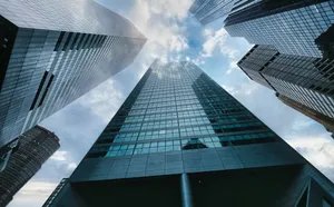 Mirrored Skyscrapers In Low-angle Wallpaper