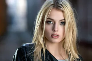 Model's Face With Blue Eyes Wallpaper