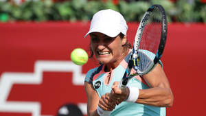 Monica Niculescu Exhibiting Perfect Tennis Swing Wallpaper