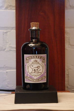 Monkey 47 Gin Schwarzwald Dry Bottle Display Wallpaper