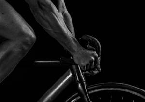 Monochrome Cycling Man Close-up Wallpaper