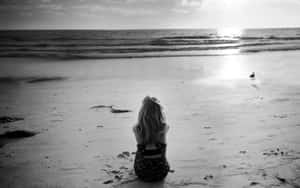 Monochrome Lonely Girl On Beach Wallpaper