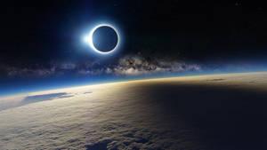 Moon And Eclipse In Outer Space Wallpaper