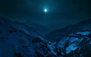 Moonlit Snow Mountain Summit Wallpaper