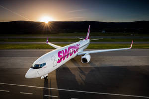 Morning Flight Of Swoop Airlines Wallpaper